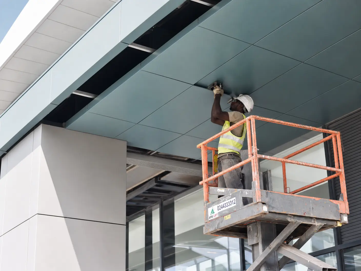 ACP canopy, soffit and entrance underside cladding in Ghana — service alucobond canopy soffit commercial airport city accra alucobondghana, Accra Ghana