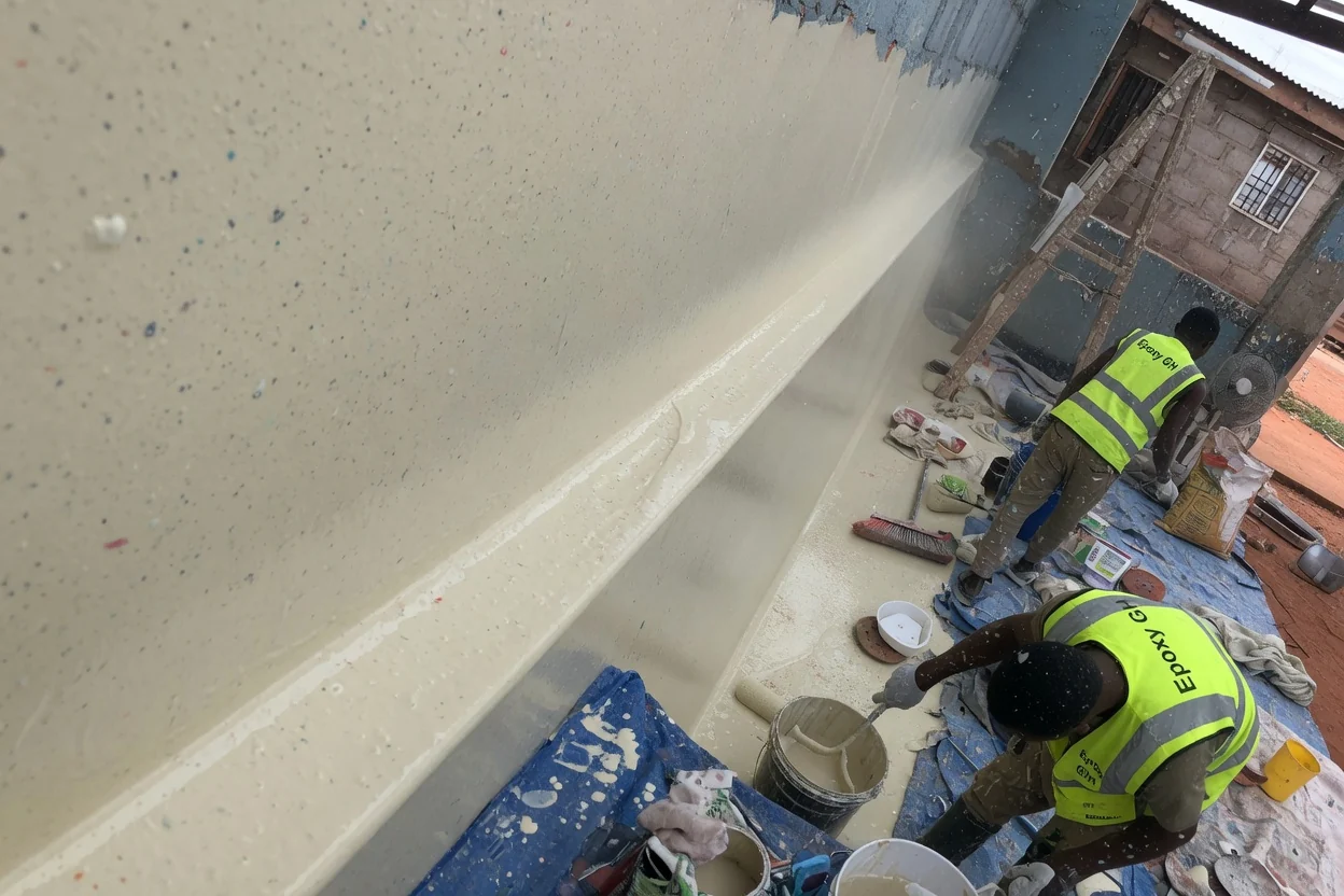 Hygienic coved epoxy floor for food and pharma in Accra, Ghana — hygienic epoxy coved base detail food plant accra epoxygh, Accra Ghana