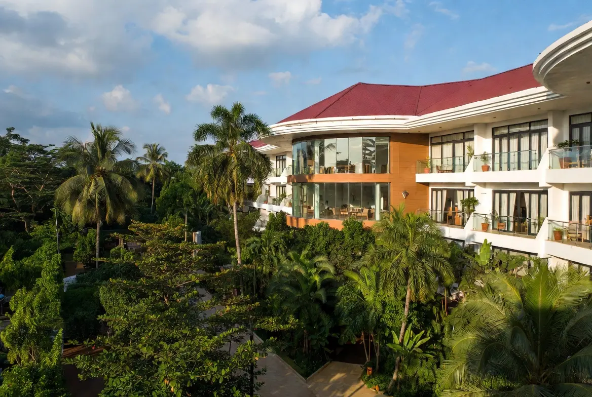 Luxury boutique hotel landscape with layered tropical planting in Accra, maintained by Landscape GH