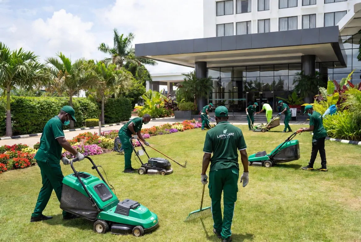 Carpet-grass garden and courtyard lawn kept guest-ready at a hospitality venue in Osu, Accra